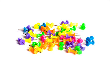 Colorful pushpins on a white background