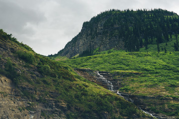Stream Runs through Lush Mountain Landscape