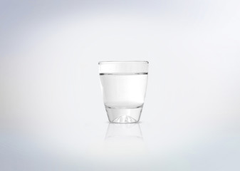 Silver shot of vodka, tequila, rum, schnapps, akvavit, pisco, cachaca or other alcoholic distilled...
