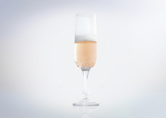 A sparkling Champagne or Prosecco glass with bubbles. Isolated on white background. 