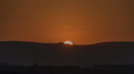 Sunset near Milada lake in north Bohemia