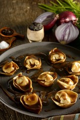 Stuffed tortelli of Ossobuco with truffled sauce