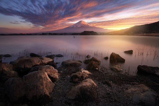 Beautiful scenery during sunset of Mountain Fuji with colorful sky at Oishi Park, kawaguchiko lake in Japan This is a very popular for photographers and tourists. Travel and natural Concept