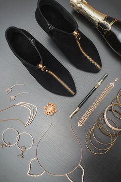 top view flat lay of accessories of a woman to party