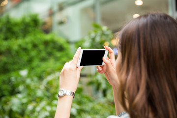 Young asian lady traveling in city center