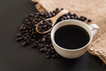 Obraz na płótnie Canvas Coffee cup and beans