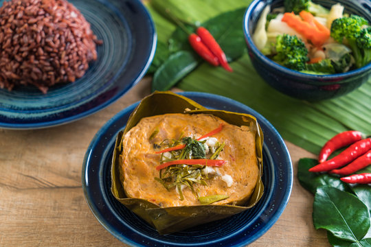 steamed fish with curry paste and berry rice