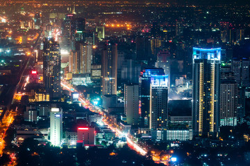 Obraz na płótnie Canvas Bangkok Skyline at night, aerial view of capital in Thailand.