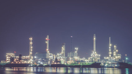 Obraz na płótnie Canvas Refinery plant area at twilight with reflection (oil, refinery, industry)