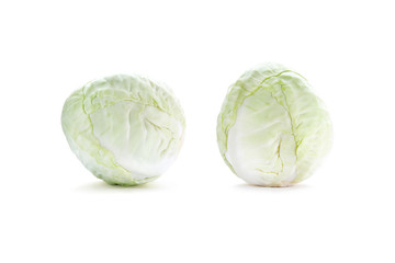 two small light cabbage isolated on white background