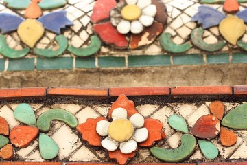 Old floral, ceramic in Wat Pho at Thailand