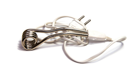 Small individual boiler for a cup on a light background