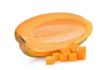 half of fresh papaya seedless with cubes isolated on white background