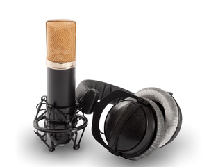 Headphones and condenser microphone isolated on the white background