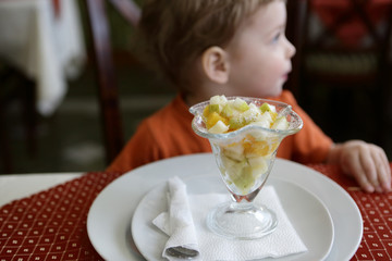 Child has fruit salad