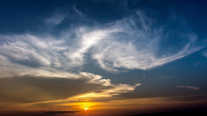 Fototapeta na wymiar Colorful dramatic sky with cloud at Sunrise.Sky with sun background.