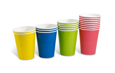 Piles of the disposable paper cups in different colors