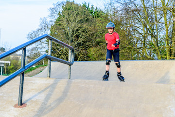 Day view teen boy scatting on playground