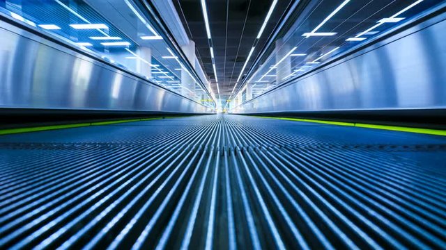 4K Motion blur timelapse of moving escalator in the airport 