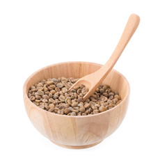 Green Arabica coffee beans in a wooden bowl Isolated on a white background