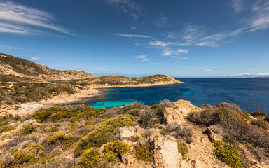 Fototapeta na wymiar Turquoise sea and rocky coastline at Revellata in Corsica