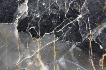 dark gray marble texture have yellow and white pattern