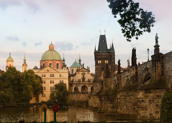 Fototapeta na wymiar View of Vltava river, Charles Bridge, Bridge Tower, Karlova Street, Klementinum, St Salvator Church