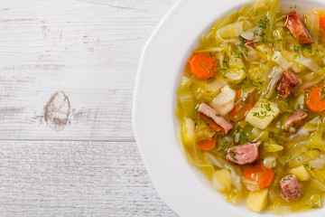 Homemade cabbage soup, cooked on smoked ribs.