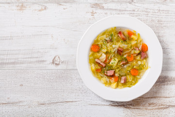 Homemade cabbage soup, cooked on smoked ribs.