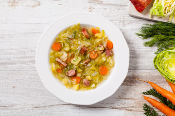 Homemade cabbage soup, cooked on smoked ribs.
