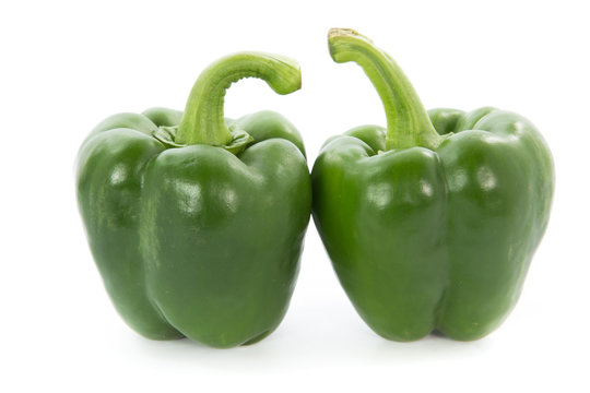 Green capsicum or sweet pepper isolated on white background