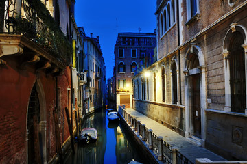 Naklejka na ściany i meble Venice by night - view of a canal, Venezia, Italy