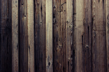 brown wood texture. Background light old wooden panels.Boards are nailed vertically