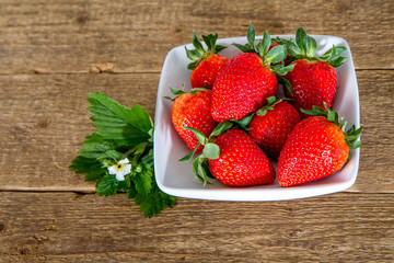 Strawberries in the wood bowl
