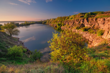 Fototapeta na wymiar A beautiful magical lake on a summer morning at dawn V