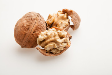 Walnuts on a white background.