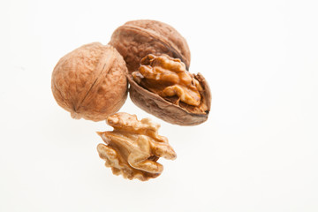 Walnuts on a white background.