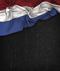 Netherlands Flag Vintage on a Grunge Black Chalkboard With Space For Text