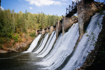 Old historic stone dam in Russia