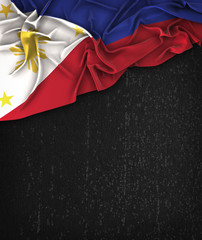 Philippines Flag Vintage on a Grunge Black Chalkboard With Space For Text © natanaelginting