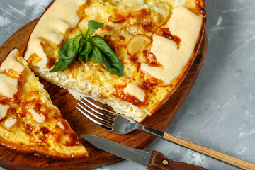 Homemade French open cake with leek and cheese. Quiche.