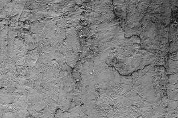 Wall fragment with scratches and cracks