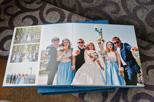 Open pages of wedding photo book and album