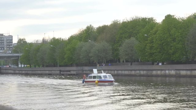 Kaliningrad - May 2017 Russian  Sightseeing boat with tourists swims along the river in the city. Tourists Boats Ships Pregolya River Kaliningrad Russia, Tourism Traveling Europa View.