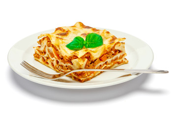 Portion of tasty lasagna isolated on white