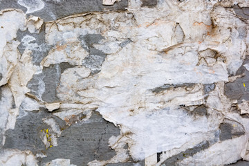 Wall with remains of paper posters