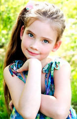Portrait of adorable smiling little girl outdoor