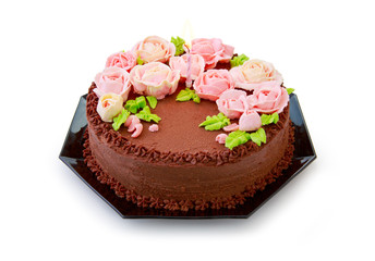 Chocolate birthday cake with butter cream roses.