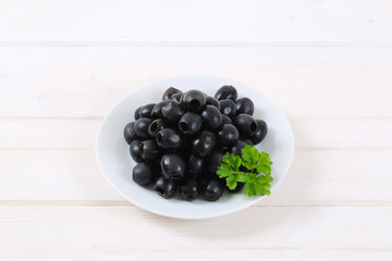 black olives with parsley