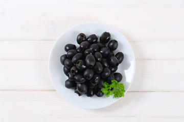 black olives with parsley